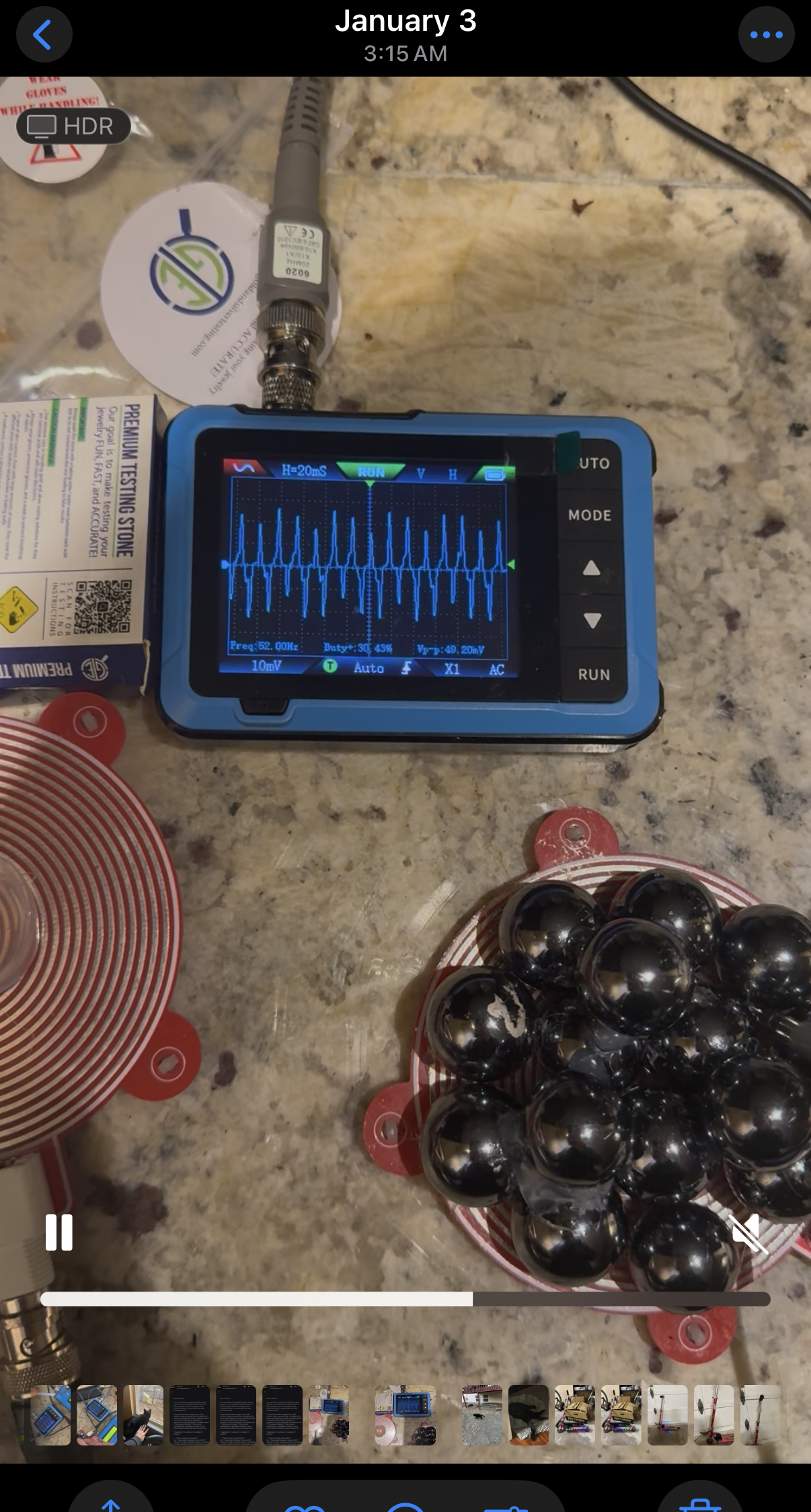 Full photo of the ARC15 bench test with oscilloscope, spiral coil, and sphere array visible.