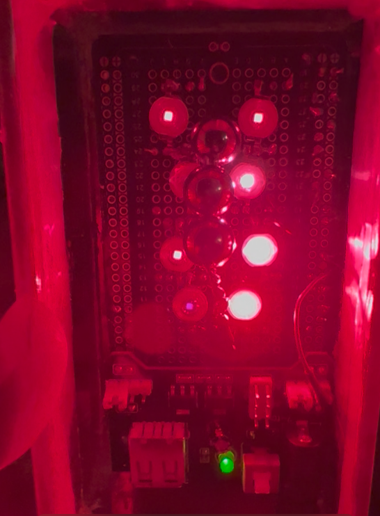 Real bench shot of the PulsarTek IR v.67 unit glowing red.